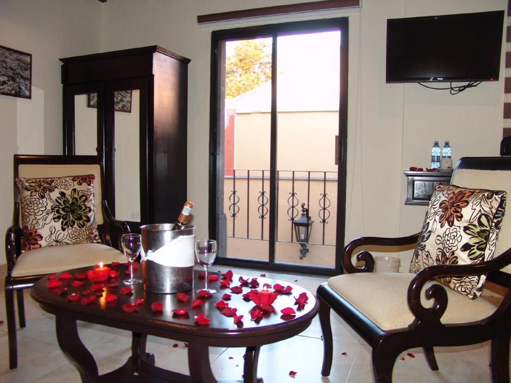 Casa Del Tio Hotel Boutique سان ميغيل دي الليندي الغرفة الصورة A suite at the hotel