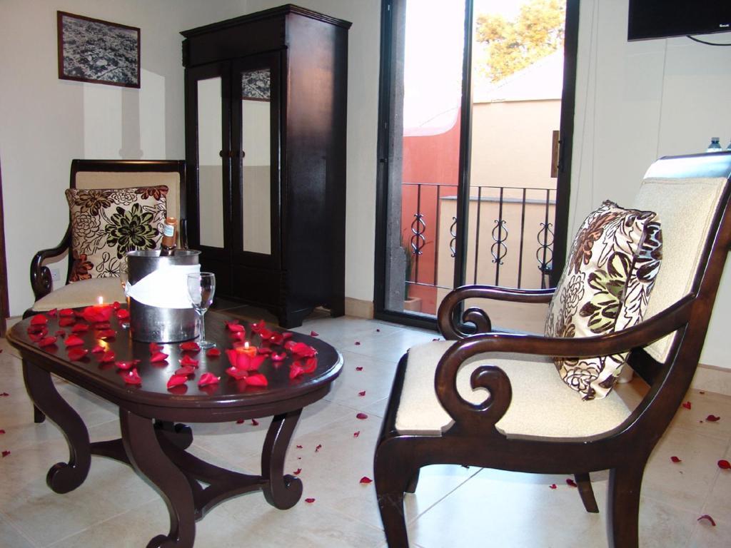 Casa Del Tio Hotel Boutique سان ميغيل دي الليندي الغرفة الصورة A suite at the hotel