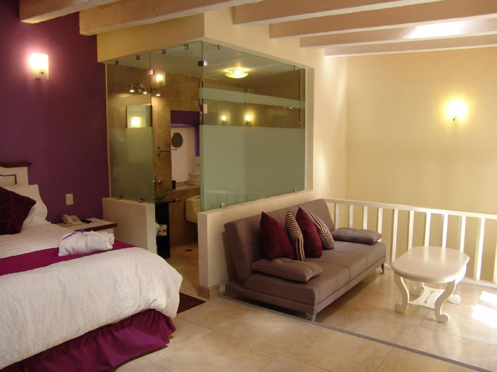 Casa Del Tio Hotel Boutique سان ميغيل دي الليندي الغرفة الصورة Suite at the hotel