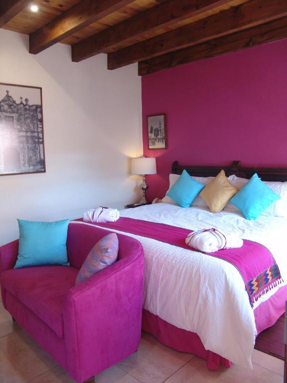 Casa Del Tio Hotel Boutique سان ميغيل دي الليندي الغرفة الصورة A bedroom at the hotel