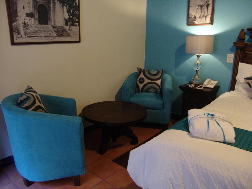 Casa Del Tio Hotel Boutique سان ميغيل دي الليندي الغرفة الصورة A room at the hotel